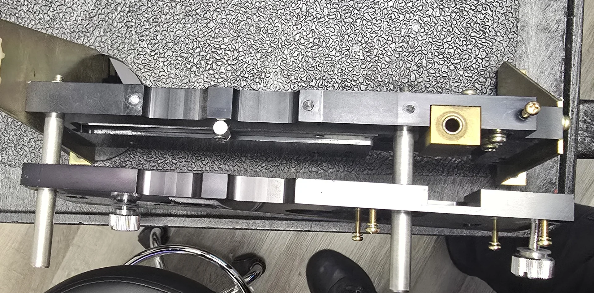 Reader main housing and subhousing assembly with metal rails and brackets