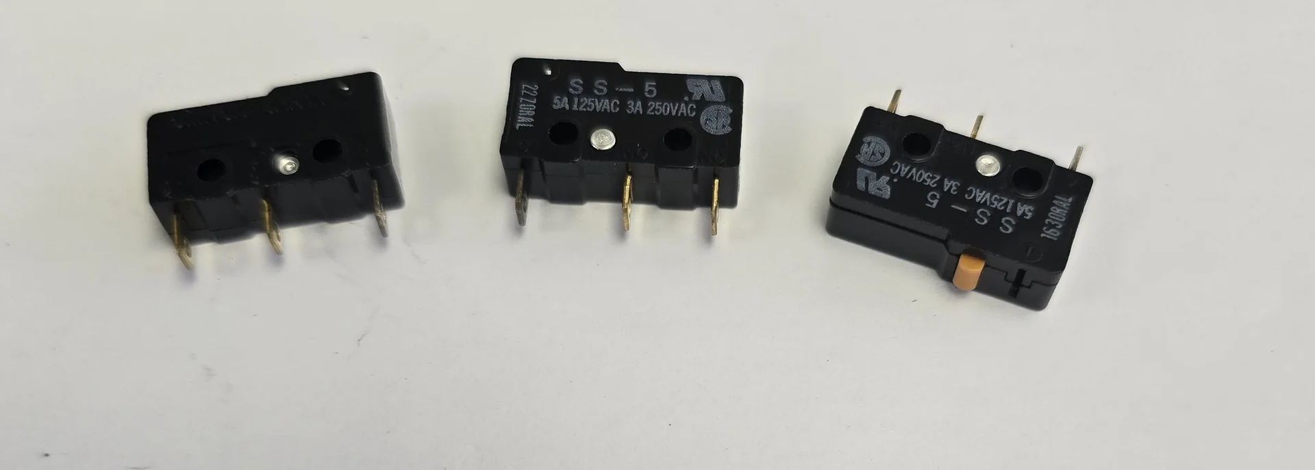Three black reader micro switches with metal terminals