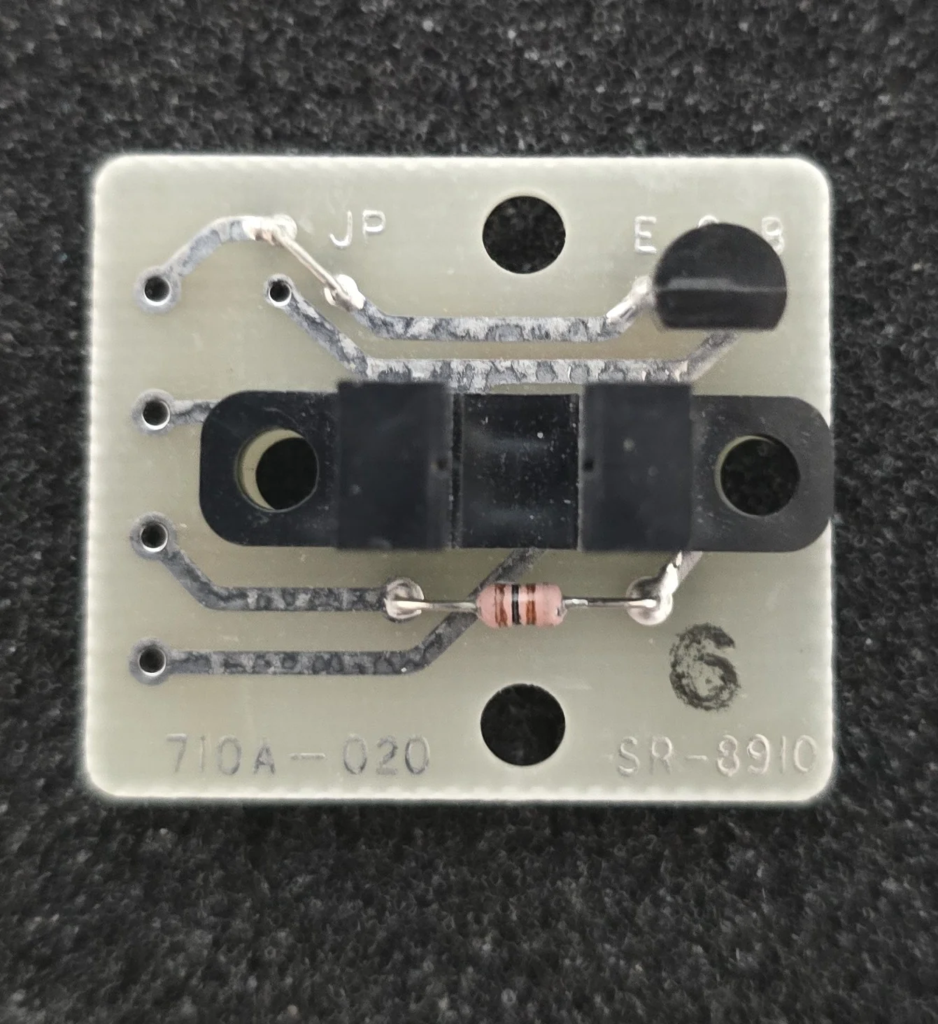 Reader timing sensor assembly on a metal mounting plate