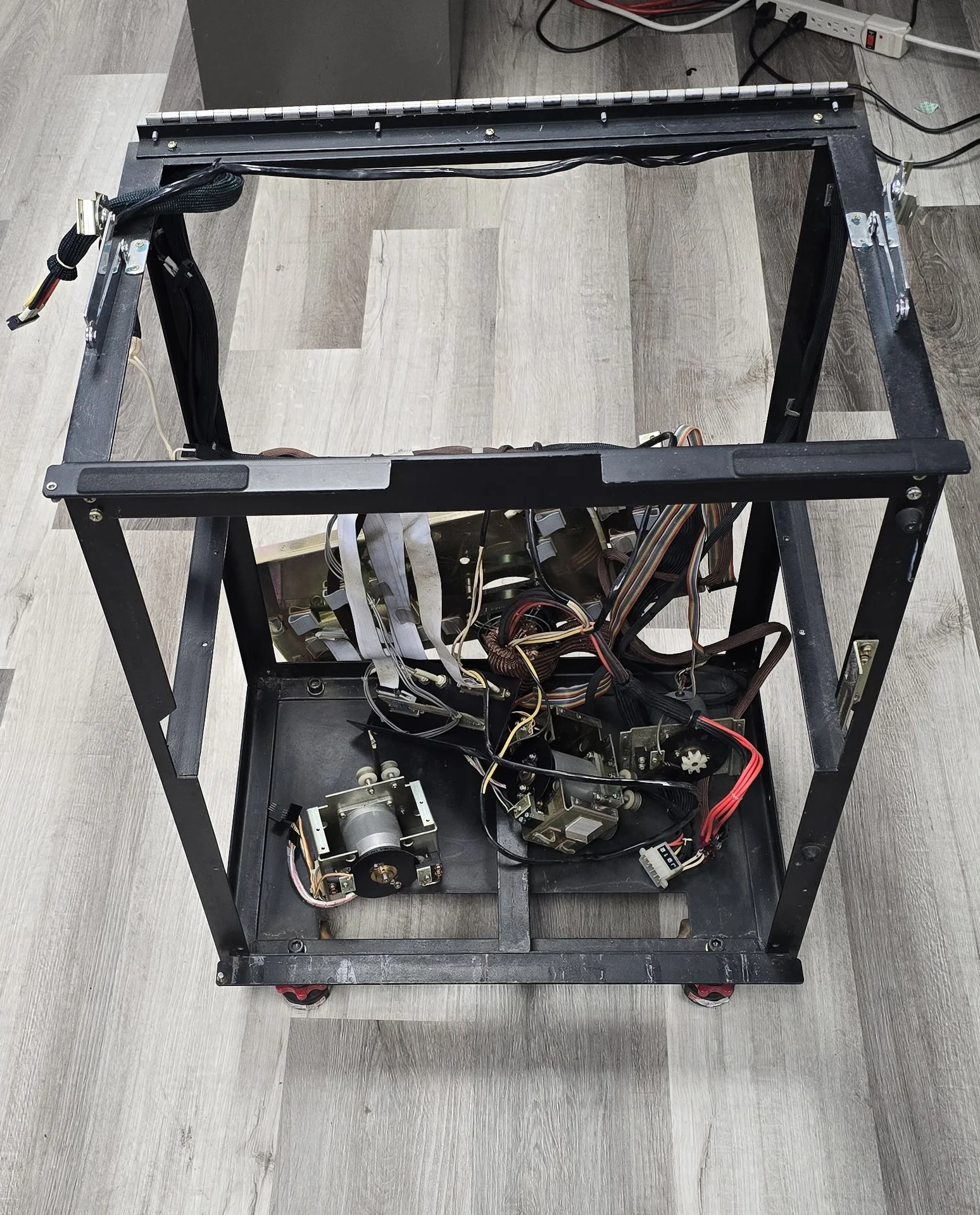 UD-710 reader with panels removed, exposing its frame and internal components