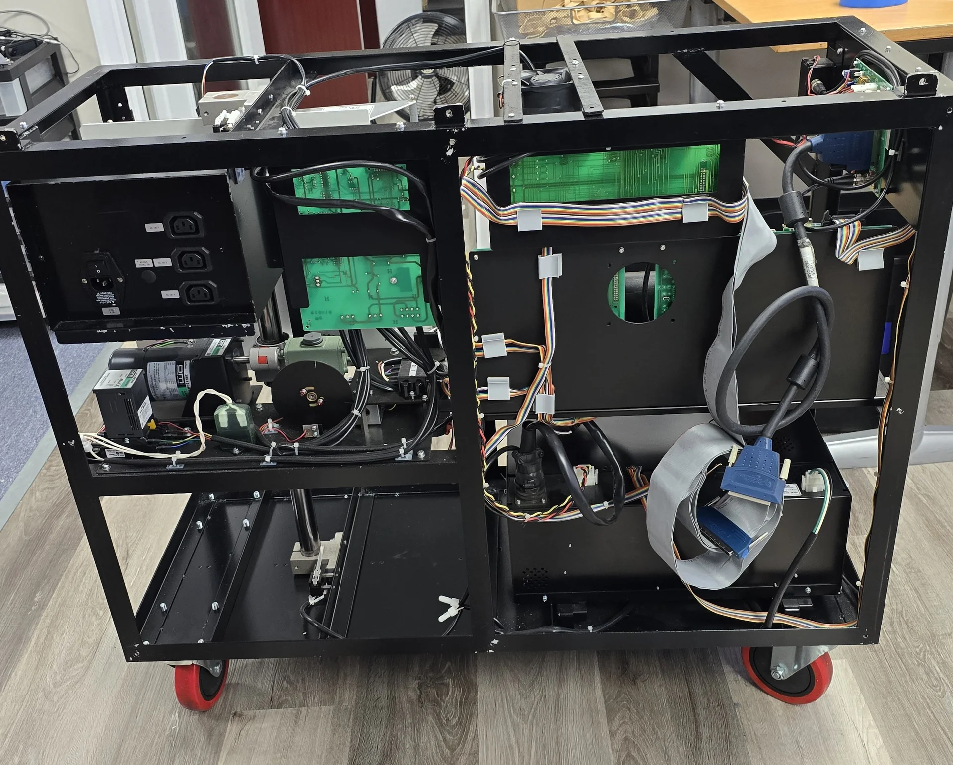 UD-7900 reader frame with exposed wiring and electronics during refurbishment