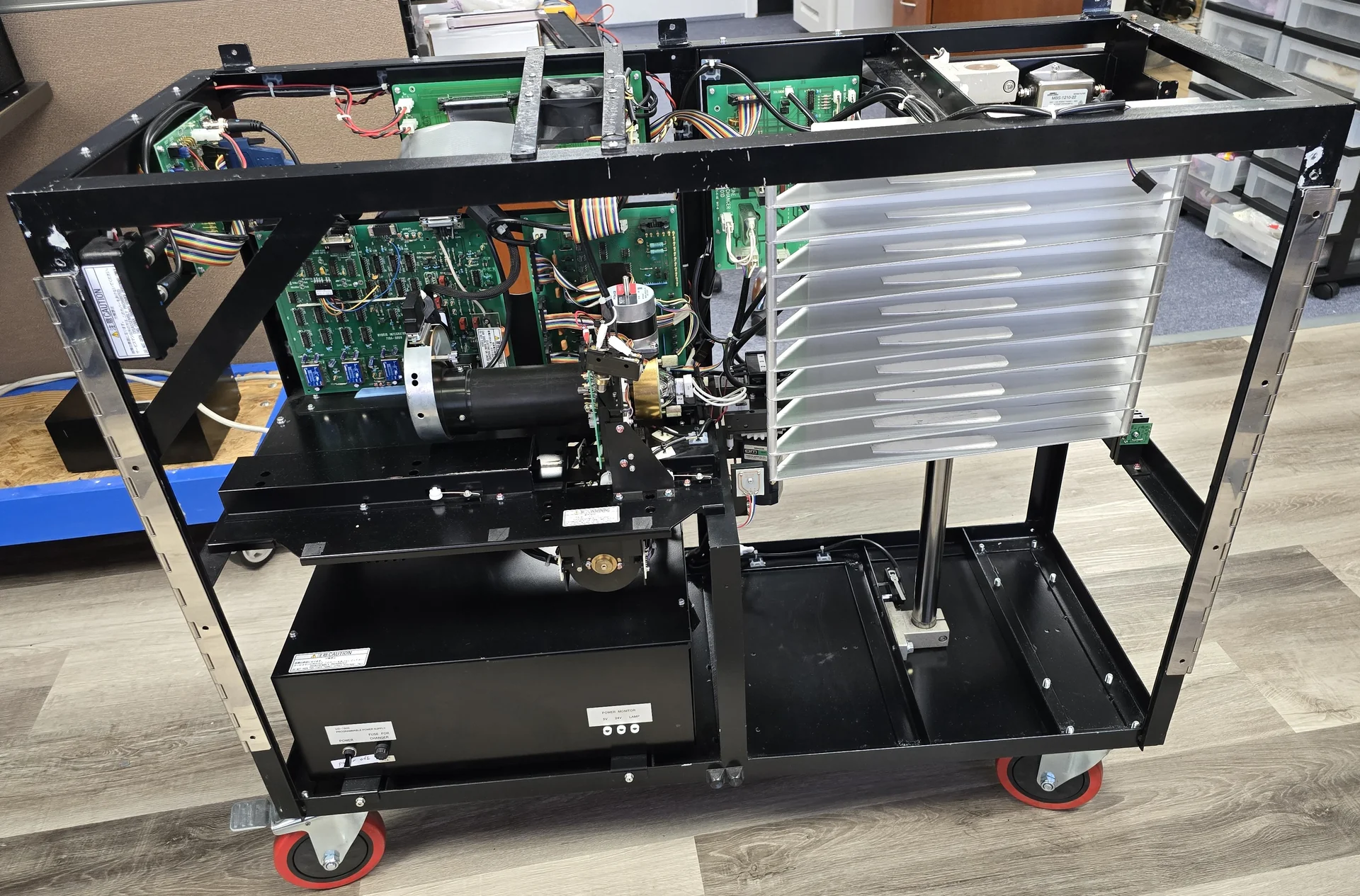Front of a UD-7900 reader with panels removed during refurbishment